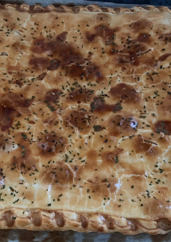 Una foto de Empanada atún con tomate