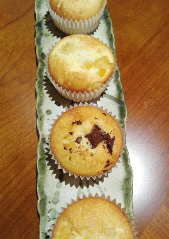 Una foto de Magdalenas de chocolate y de naranja