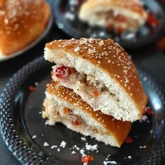 A picture of Dilkush or sweet bread with coconut and tutti frutti filling.