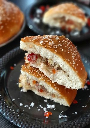A picture of Dilkush or sweet bread with coconut and tutti frutti filling.