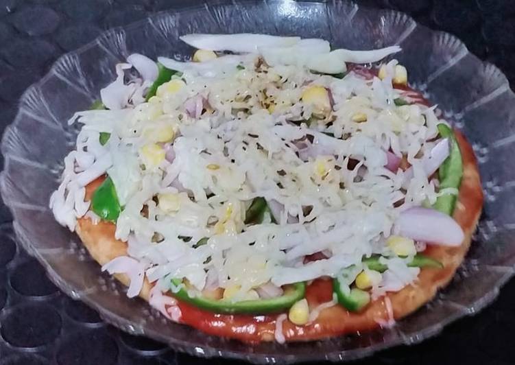 Thin crust wheat flour pizza base and yummy pizza
