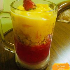 A picture of No Bake Mango Cheese Cake Mousse Jar with strawberry jelly.