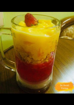 A picture of No Bake Mango Cheese Cake Mousse Jar with strawberry jelly.