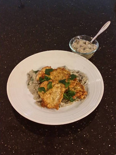 A picture of Chicken Schnitzel with a Creamy Mushroom Sauce.