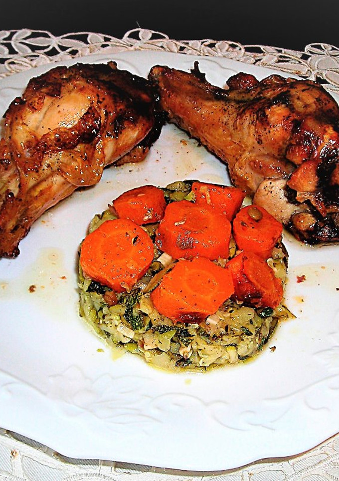 Una foto de Alas de pavo al horno con calabacín sote