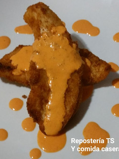 Una foto de Pechugas de pollo con salsa de pimientos del piquillo