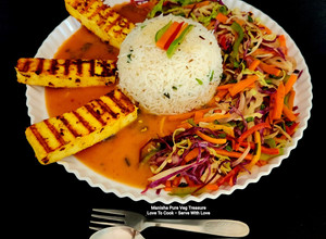 A picture of Spicy Grilled Paneer Steak Italian Herb Rice Schezwan Sauce With Exotic Sautéed Veggies Gourmet Meal.