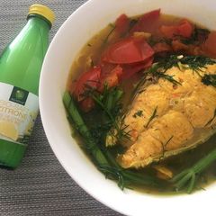 A picture of Salmon Noodles soup.