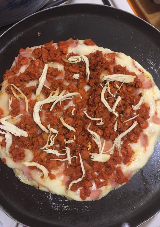 Una foto de Pizza con harina de arroz en sartén 🍳