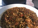 Arroz meloso de boletus, habitas, alcachofa, morcilla y costillas