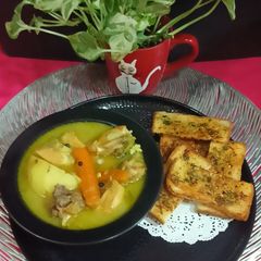 A picture of Protein Rich Healthy Chicken Stew With Garlic Bread.