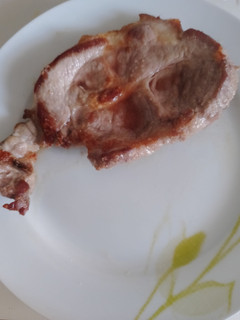 Una foto de Chuletas de cerdo de aguja a la plancha
