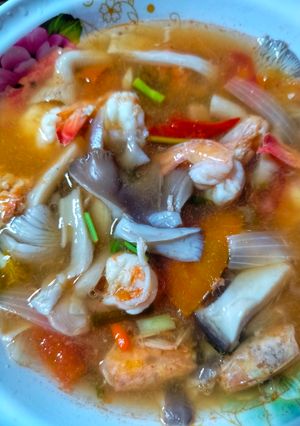 A picture of Tom Yum Soup with Mushrooms and Shrimp.