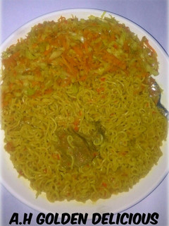 A picture of Noodles with spring roll filling.