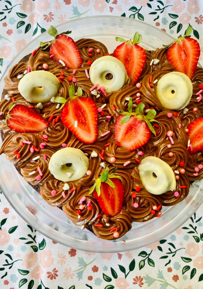Una foto de Torta brownie con cream cheese de chocolate