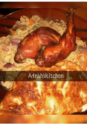 A picture of Vegetables Indomie with egg and fried chicken.