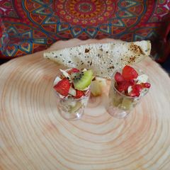 Papad fruits chaat shot A picture of Papad fruits chaat shot.