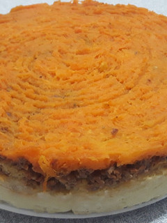 Una foto de Pastel de papa, carne y calabaza