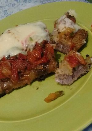 Una foto de Milanesas de carne napolitana