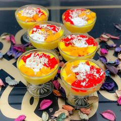 A picture of Mango Custard with Jelly and cake.