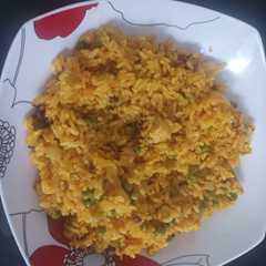 Una foto de Paella de pollo a mi manera 🥘