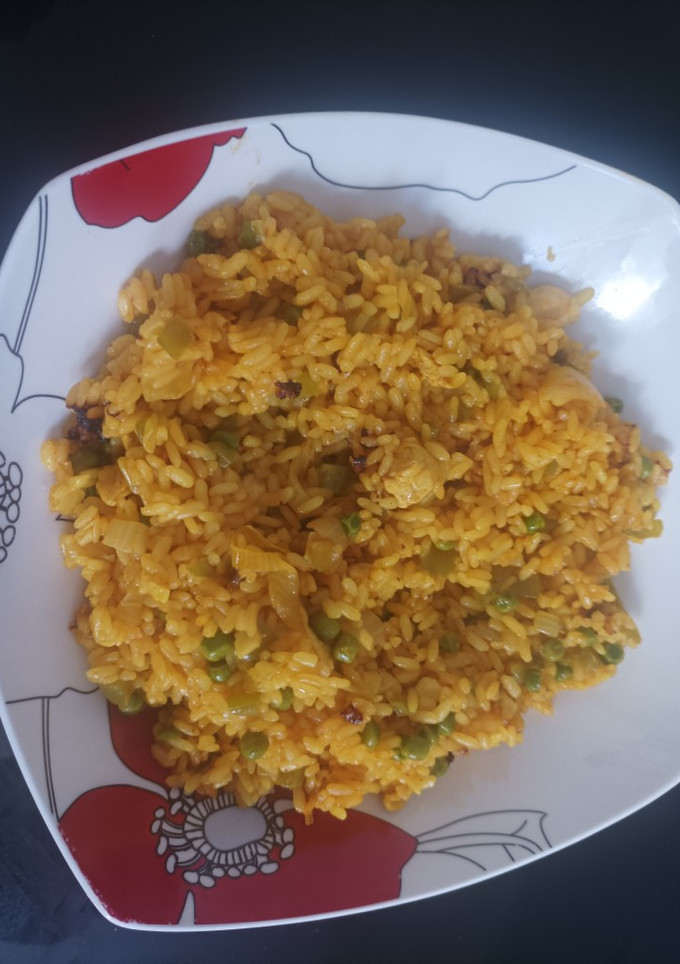 Una foto de Paella de pollo a mi manera 🥘