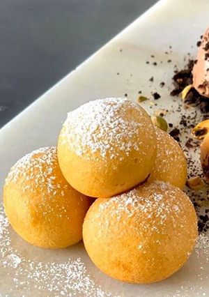 Una foto de Buñuelos de trufa al ron