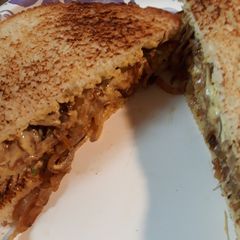 A picture of Sandwich of Caramelized Onions.