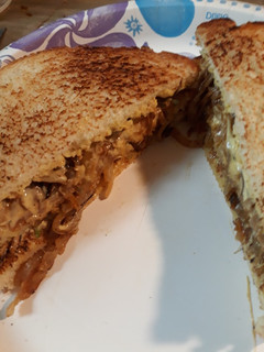 A picture of Sandwich of Caramelized Onions.