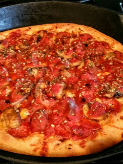A picture of Homemade Deep Dish Chicago style Deluxe Beer Pizza !.