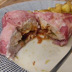 A picture of Bacon wrapped chicken.