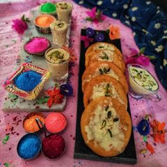 A picture of Carrot Malpua With Rabdi Shots.