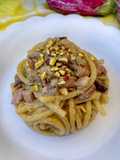 Bigoli al torchio cremosi con melanzane, mortadella e pistacchi