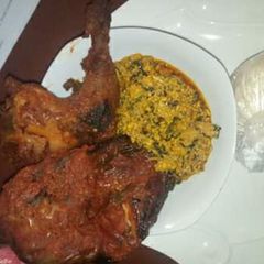 A picture of Egusi with grilled chicken and fufu.