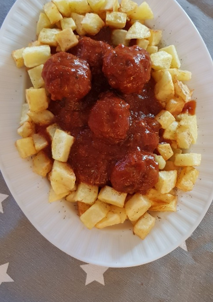 Una foto de Albóndigas con passata de tomate