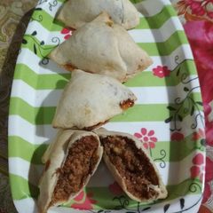 A picture of Baked khoya gur samosa.