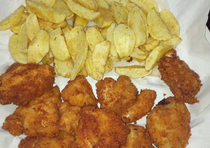 Breadcrumbed chicken with fries