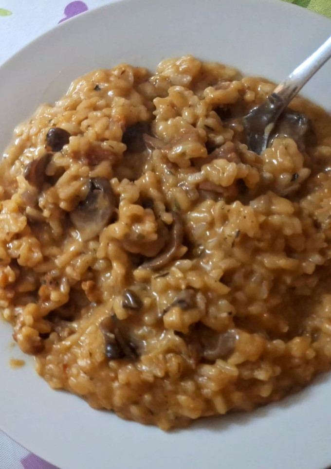 Una foto de Risotto Clásico 🍷🍚