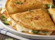 Una foto de quesadillas de maiz y queso
