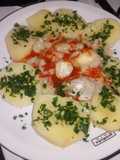 Cachetes de pollo de mar en salsa