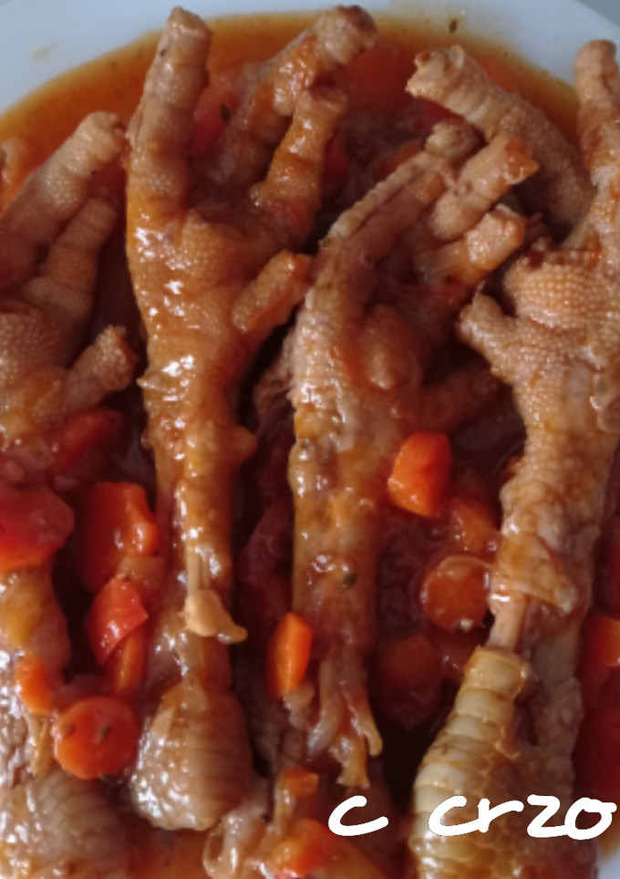 Una foto de Patas de pollo guisadas