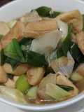 Leeks with tofu and fish cake