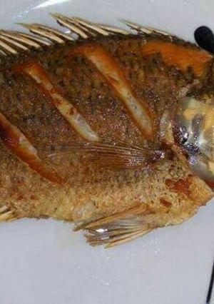 A picture of Deep fried tilapia fish.