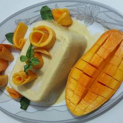 A picture of 🍧🍧🍧🍦Mango ice cream🍦🍧🍧🍧.