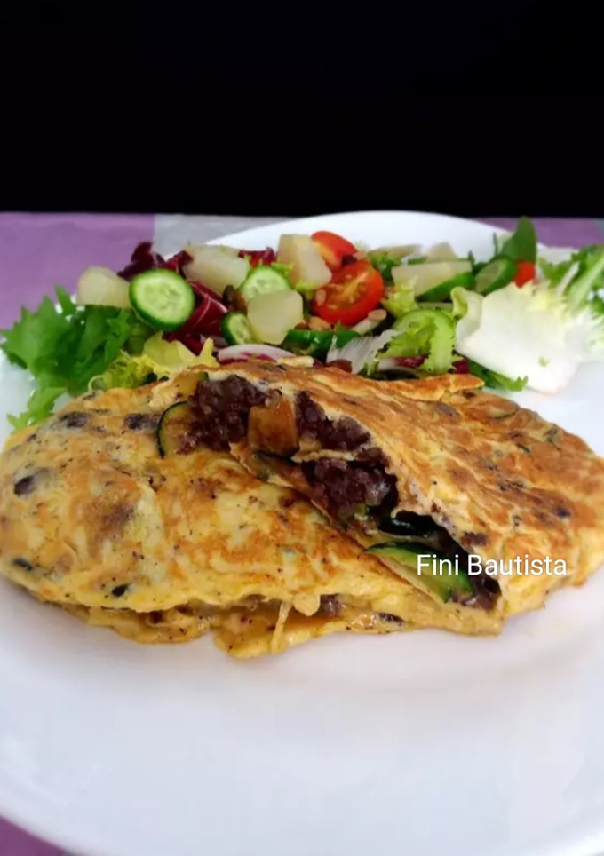 Una foto de Tortilla de calabacín y morcilla de Burgos