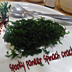 A picture of Spooky paneer spinach crackers.