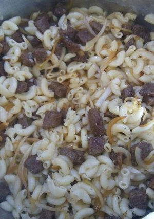Una foto de Coditos con solomo y cebolla