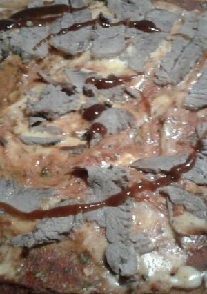 Una foto de Pizza de ternera