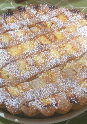 Una foto de Tarta de ricota y duraznos