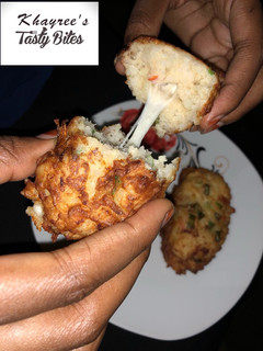 A picture of Cheesy potatoes and rice balls.